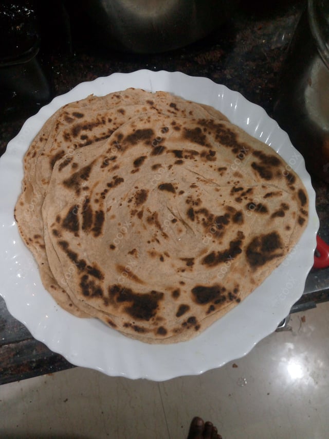 Delicious Lachha Parathas prepared by COOX