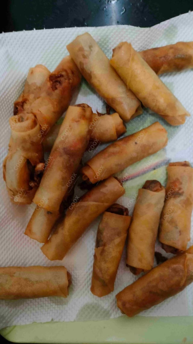 Delicious Veg Spring Rolls prepared by COOX