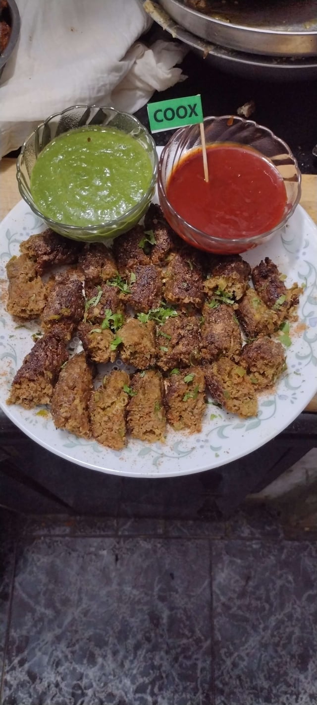 Delicious Mutton Seekh Kebab prepared by COOX