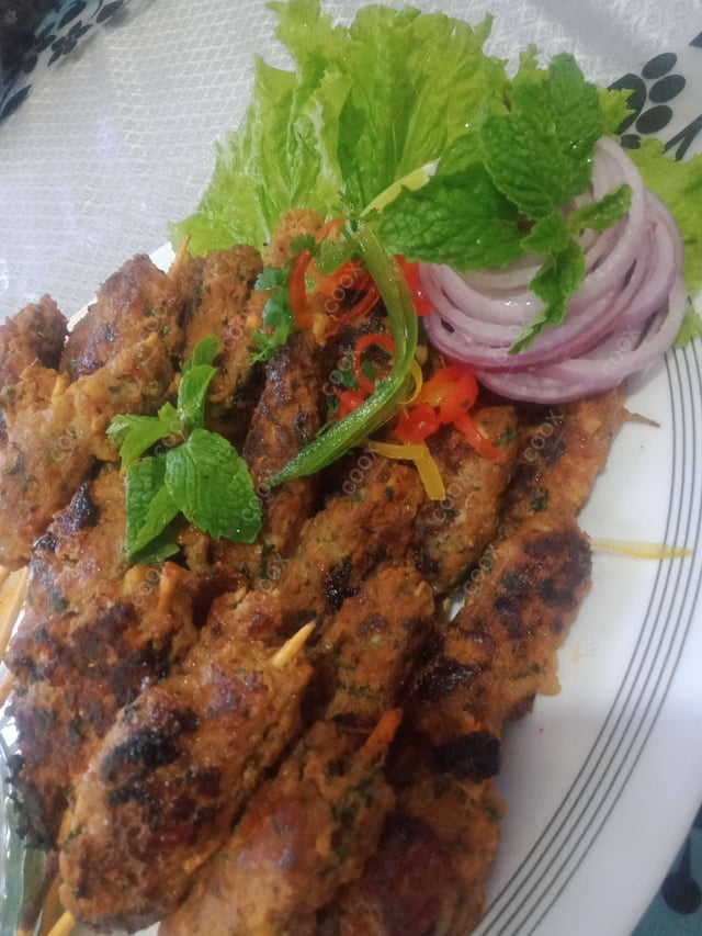 Delicious Mutton Seekh Kebab prepared by COOX