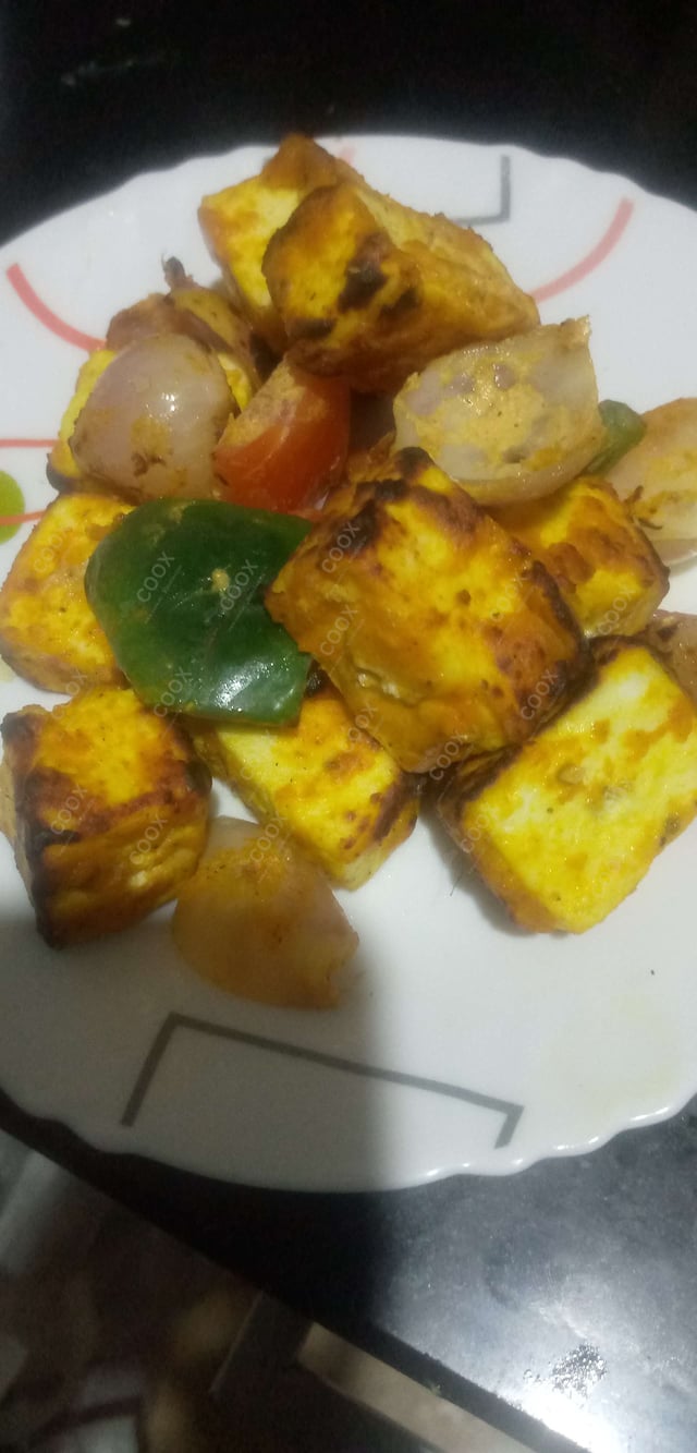 Delicious Paneer Tikka prepared by COOX