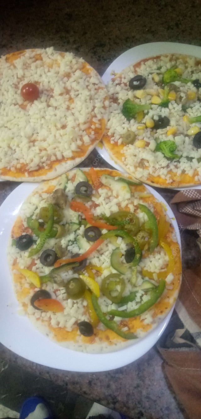 Delicious Veg Pizza prepared by COOX