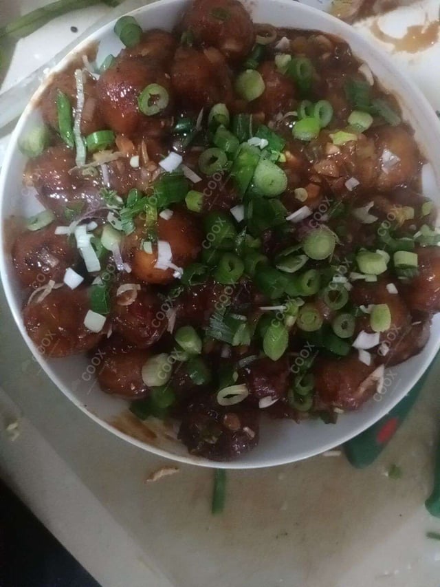 Delicious Veg Manchurian (Dry) prepared by COOX