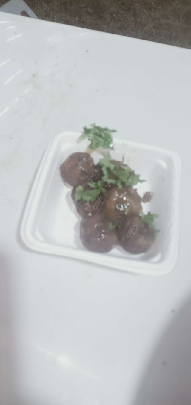 Delicious Veg Manchurian (Dry) prepared by COOX