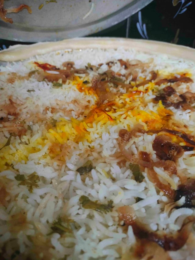 Delicious Chicken Biryani prepared by COOX