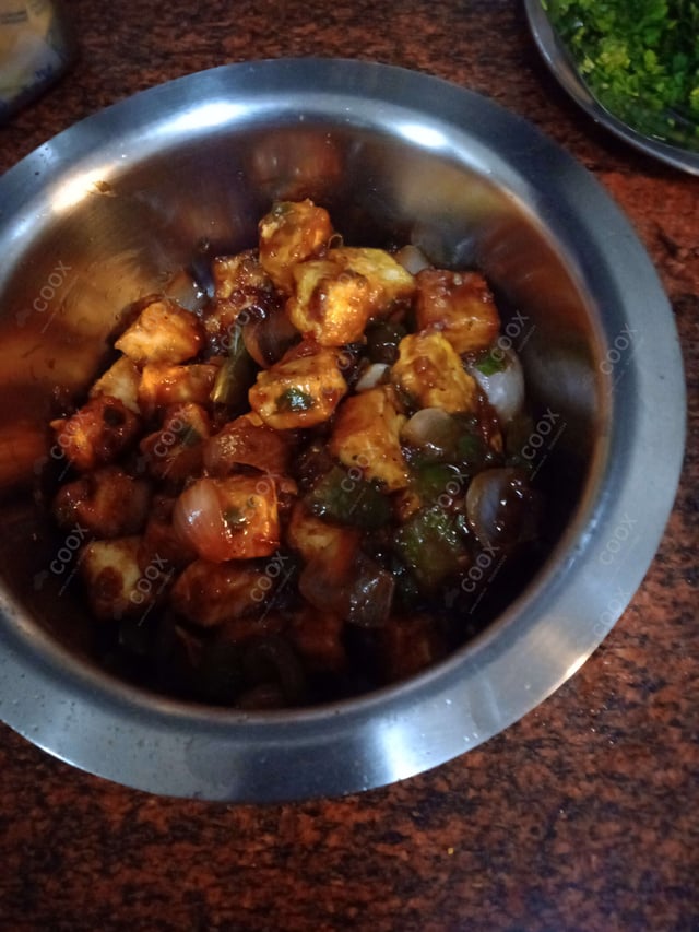 Delicious Chilli Paneer (Dry) prepared by COOX