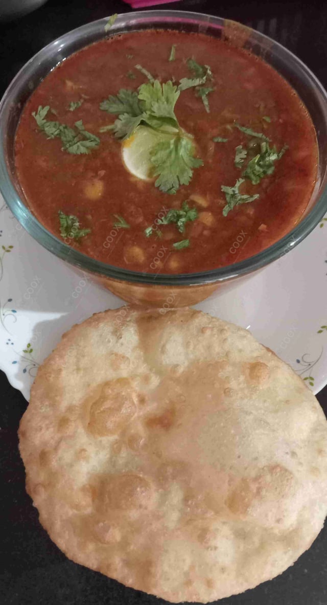 Delicious Chana Bhatura prepared by COOX