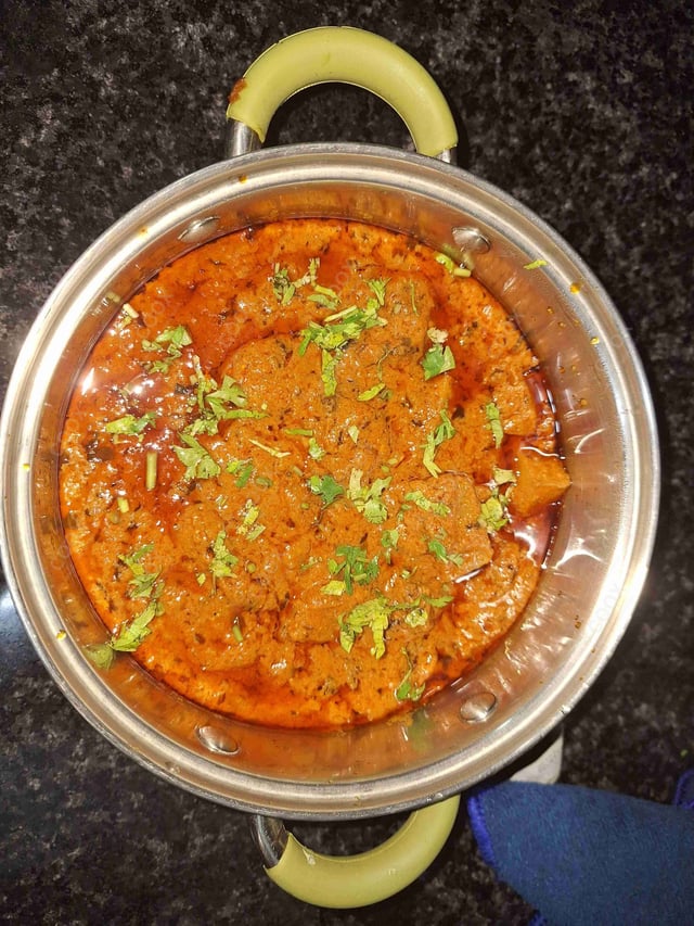 Delicious Dum Aloo prepared by COOX