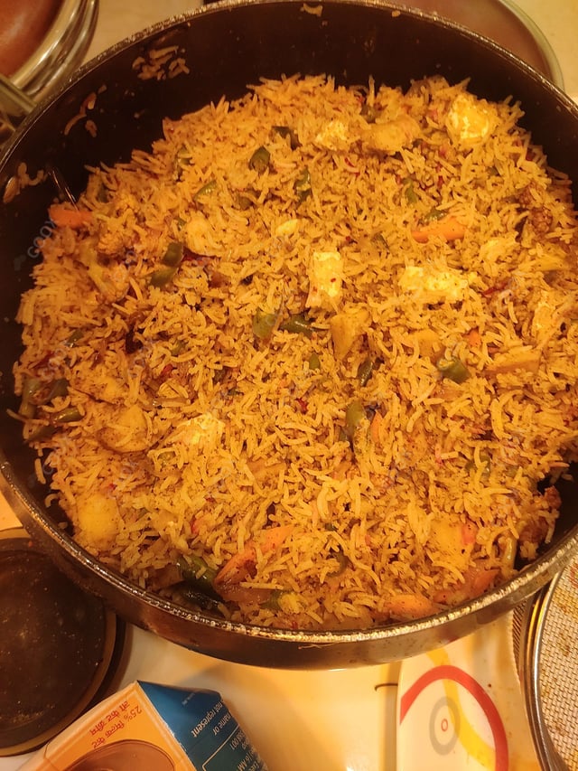 Delicious Veg Biryani prepared by COOX