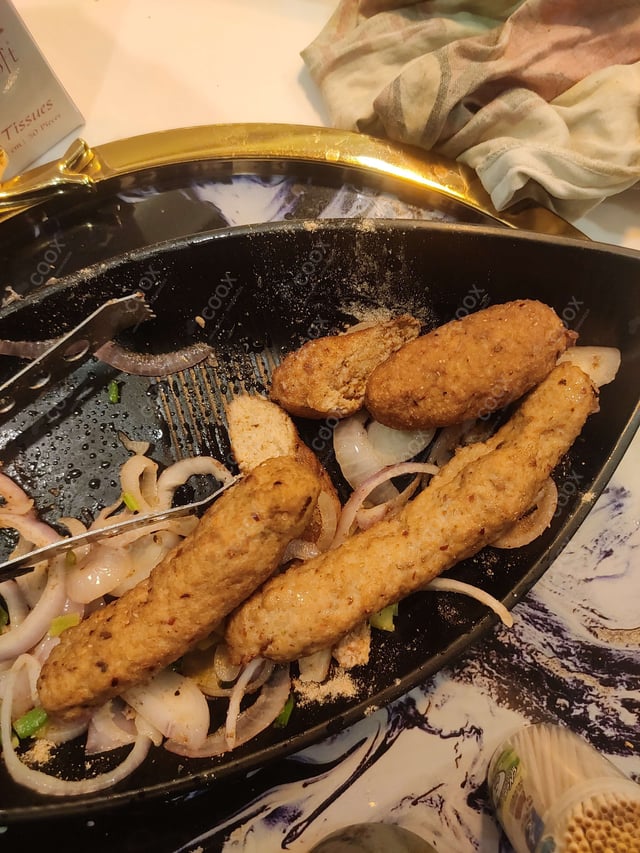 Delicious Chicken Seekh Kebab prepared by COOX