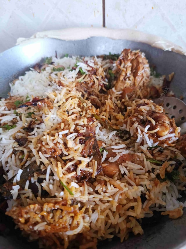 Delicious Chicken Biryani prepared by COOX