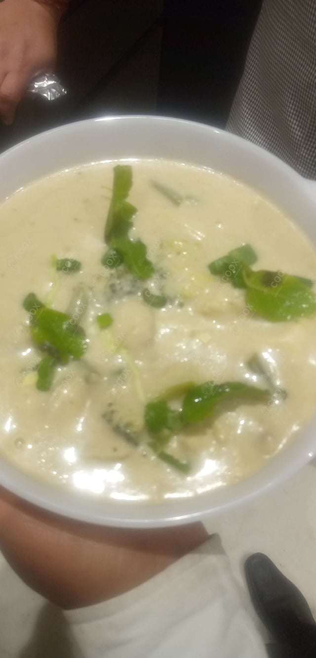 Delicious Green Thai Curry prepared by COOX