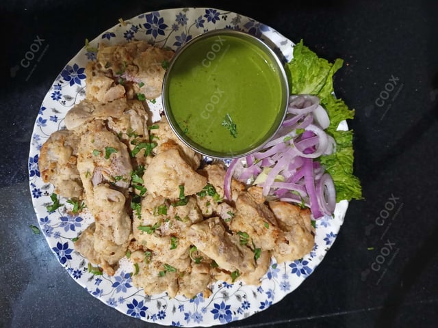 Delicious Murgh Malai Tikka prepared by COOX