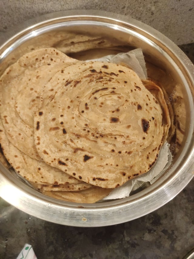 Delicious Lachha Parathas prepared by COOX