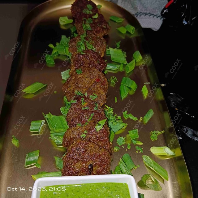 Delicious Mutton Seekh Kebab prepared by COOX