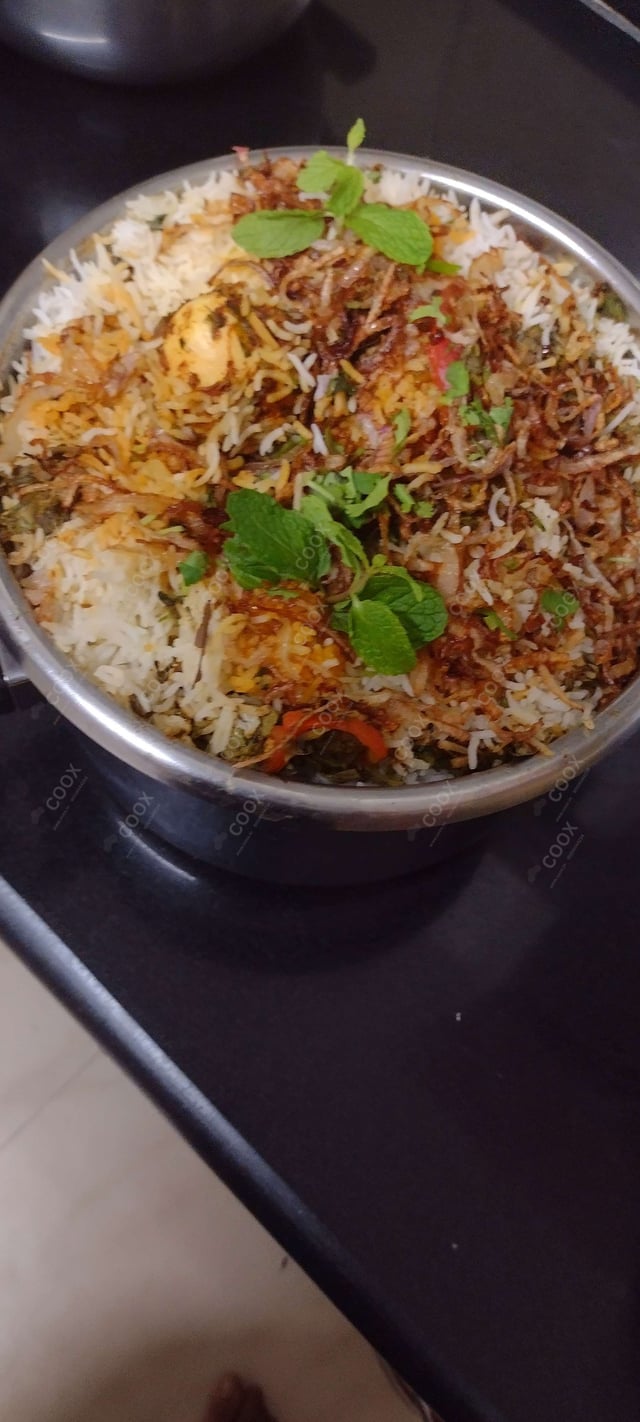 Delicious Egg Biryani prepared by COOX