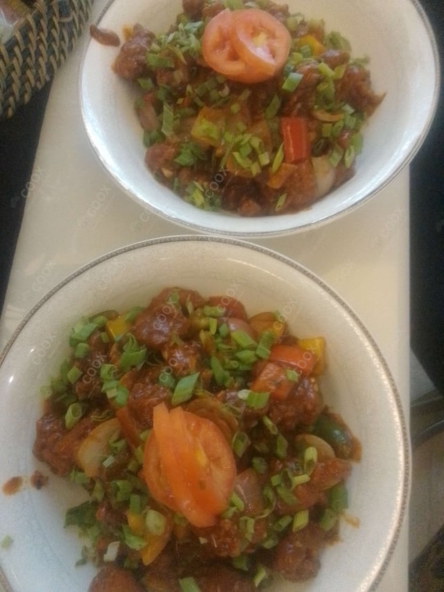 Delicious Chilli Chicken prepared by COOX