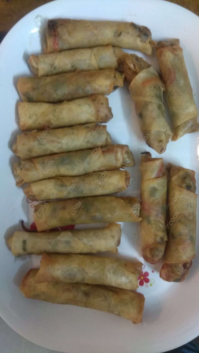 Delicious Veg Spring Rolls prepared by COOX