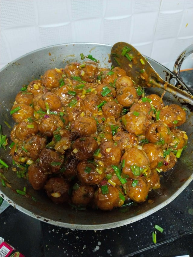 Delicious Veg Manchurian (Dry) prepared by COOX