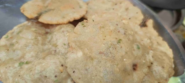 Delicious Samak Rice Ki Pooris prepared by COOX