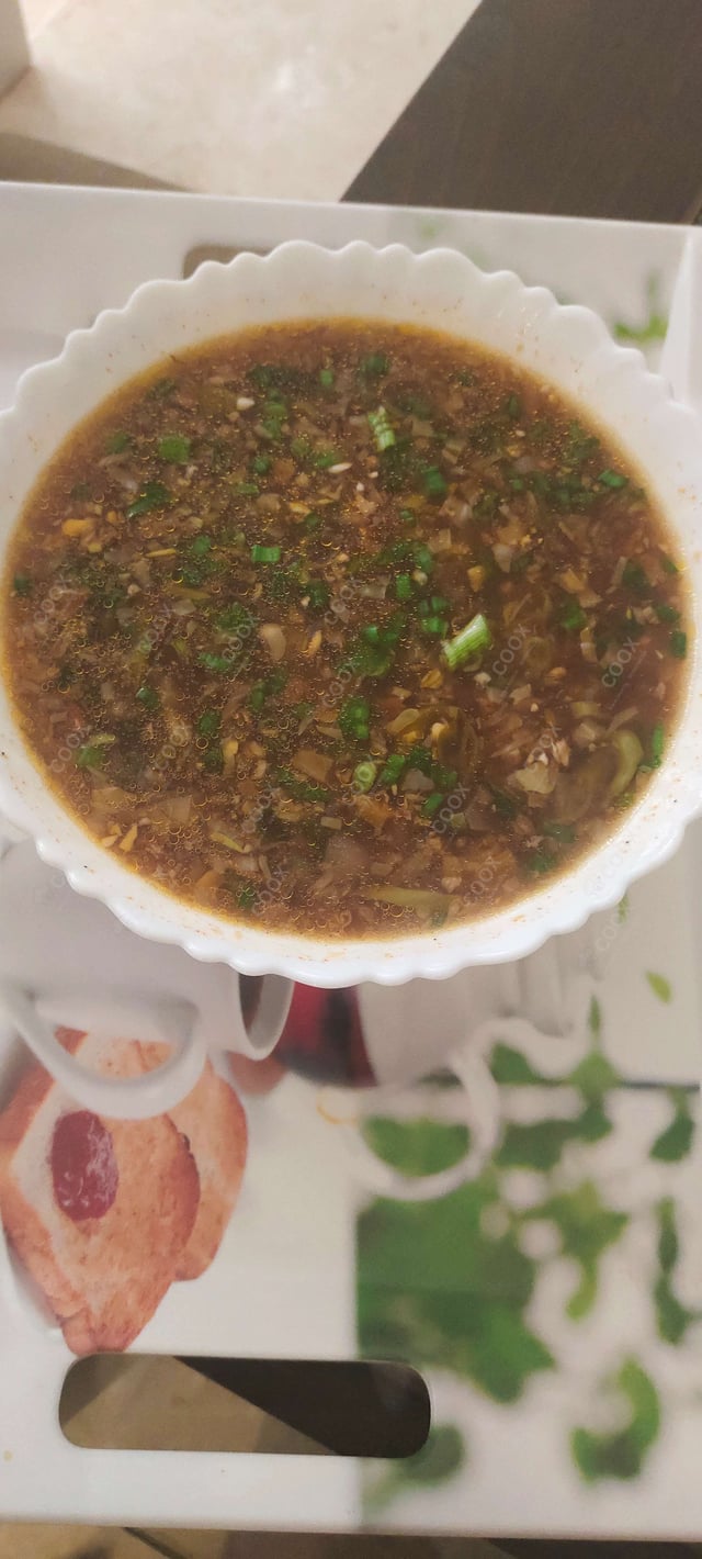 Delicious Vegetable Manchow Soup prepared by COOX