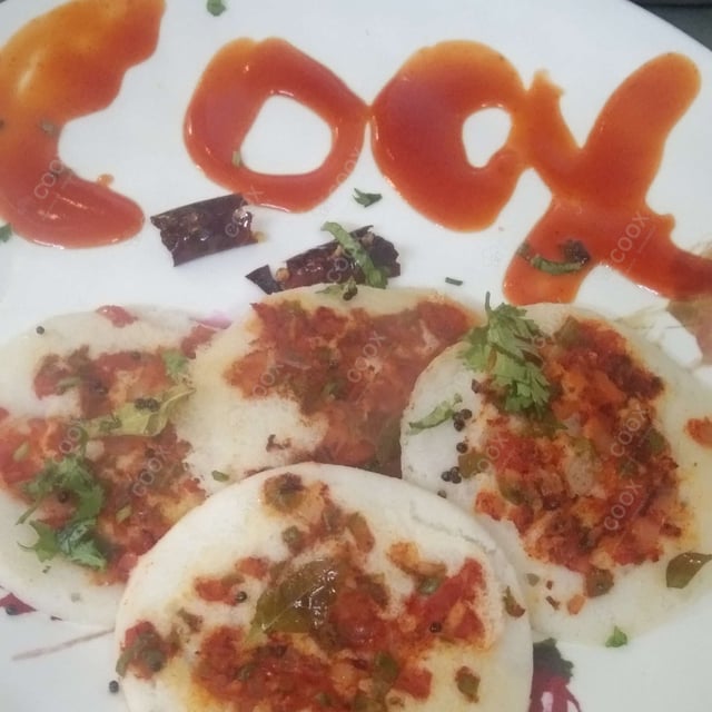 Delicious Mixed Veg Uttappam prepared by COOX