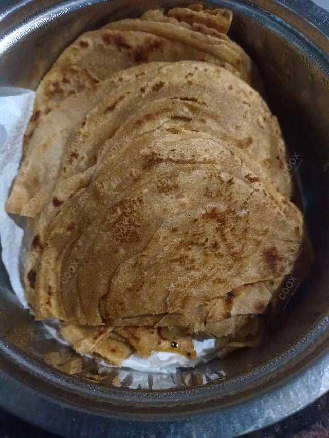 Delicious Lachha Parathas prepared by COOX