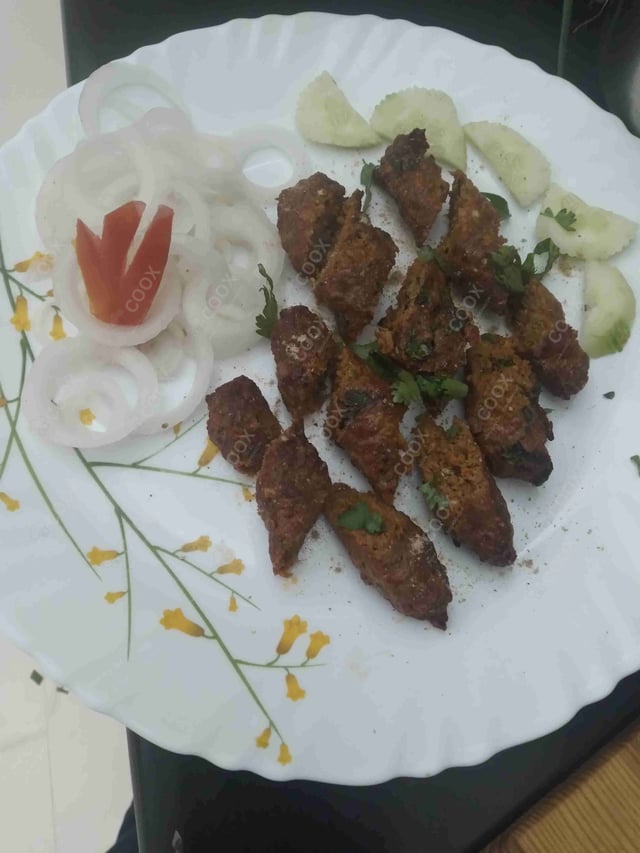 Delicious Mutton Seekh Kebab prepared by COOX