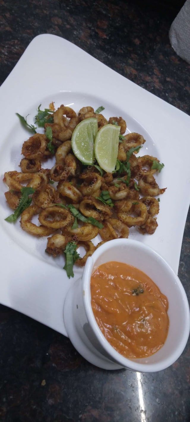 Delicious Calamari Rings prepared by COOX