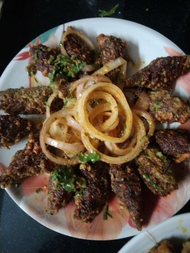 Delicious Mutton Seekh Kebab prepared by COOX