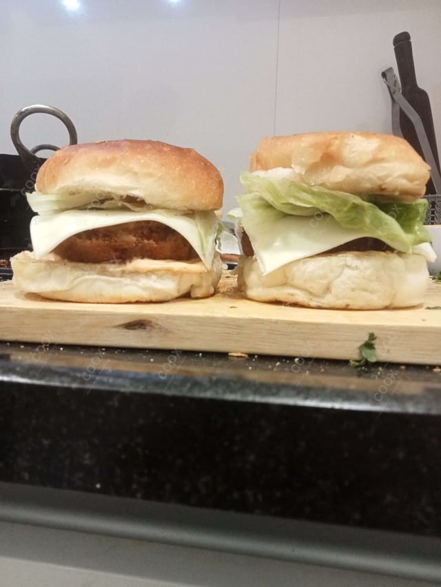 Delicious Mini Veg Burgers prepared by COOX