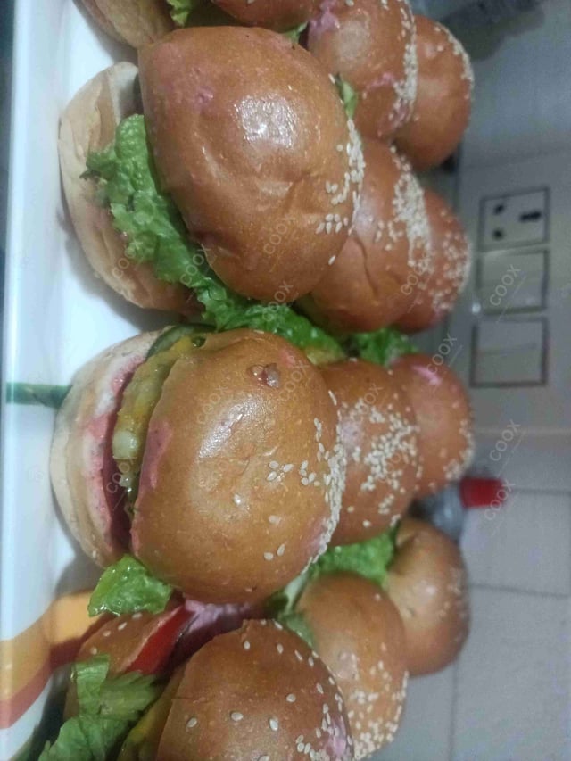 Delicious Mini Veg Burgers prepared by COOX