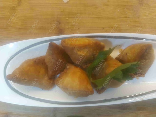 Delicious Mini Samosas prepared by COOX