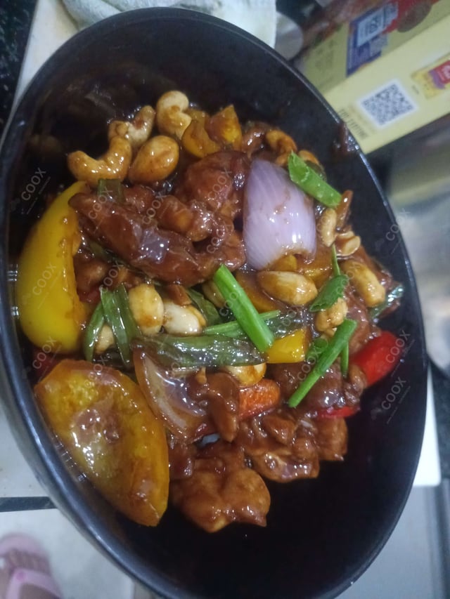 Delicious Kung Pao Chicken prepared by COOX