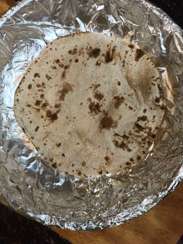 Delicious Tawa Rotis prepared by COOX