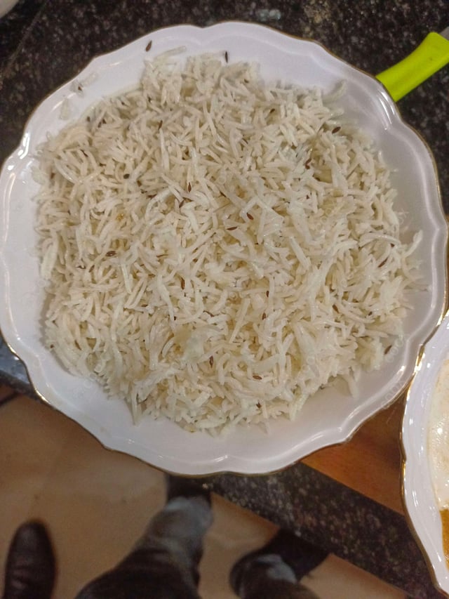 Delicious Jeera Rice prepared by COOX