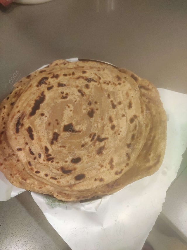 Delicious Makki ki Rotis prepared by COOX