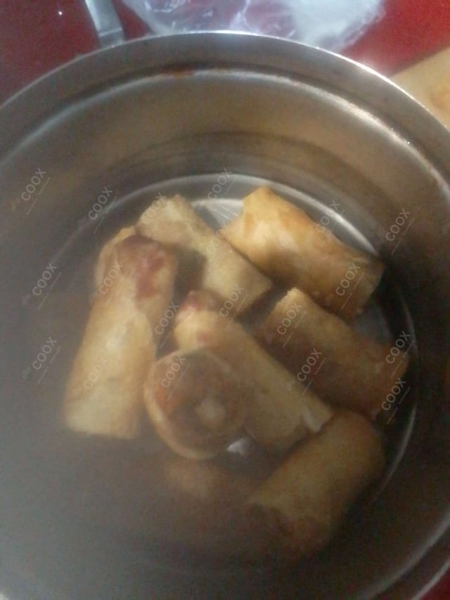 Delicious Chicken Spring Rolls prepared by COOX