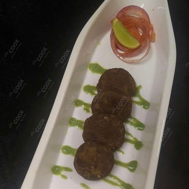 Delicious Hariyali Kebab prepared by COOX