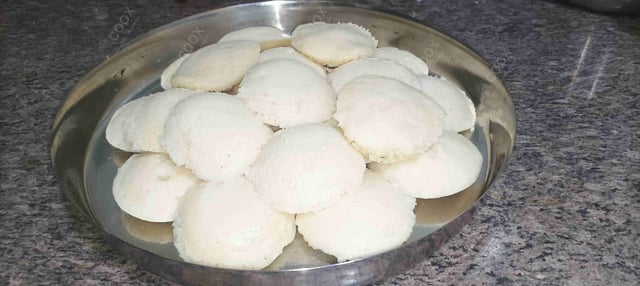 Delicious Plain Idli prepared by COOX