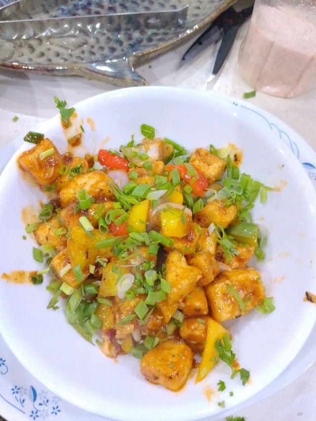 Delicious Chilli Paneer (Dry) prepared by COOX