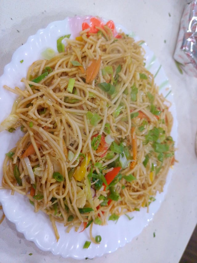 Delicious Chilli Garlic Noodles prepared by COOX