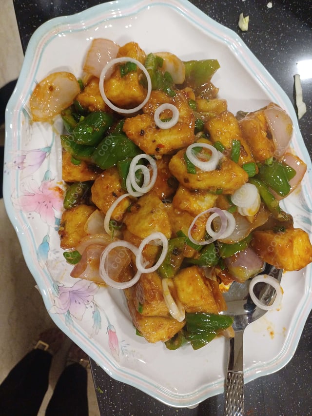 Delicious Chilli Paneer (Dry) prepared by COOX