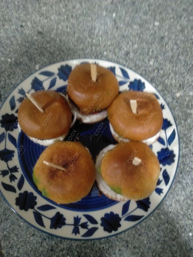 Delicious Mini Veg Burgers prepared by COOX