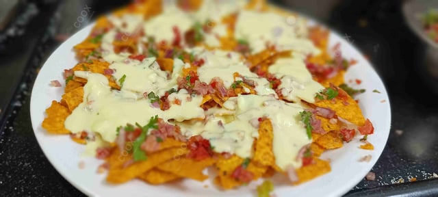 Delicious Cheese Nachos prepared by COOX