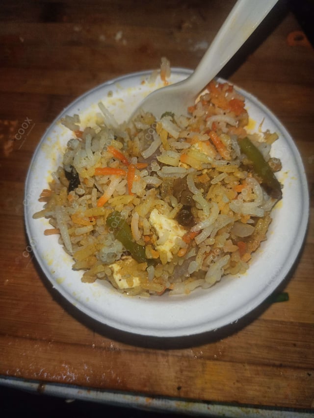 Delicious Veg Biryani prepared by COOX