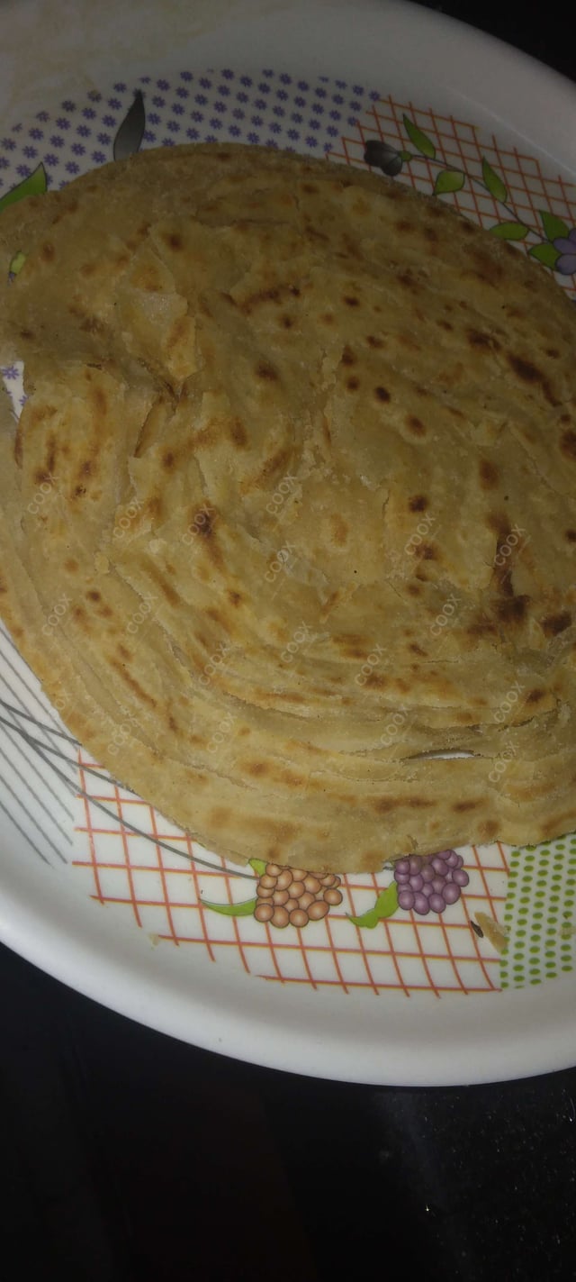 Delicious Lachha Paranthas & Rotis prepared by COOX