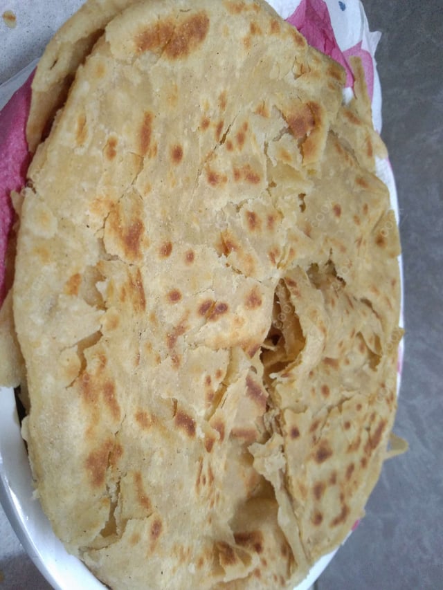 Delicious Naan (Butter / Garlic) prepared by COOX