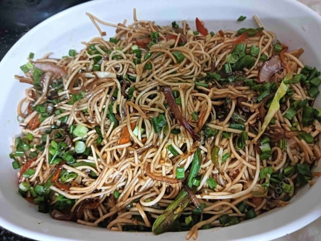 Delicious Veg Hakka Noodles prepared by COOX