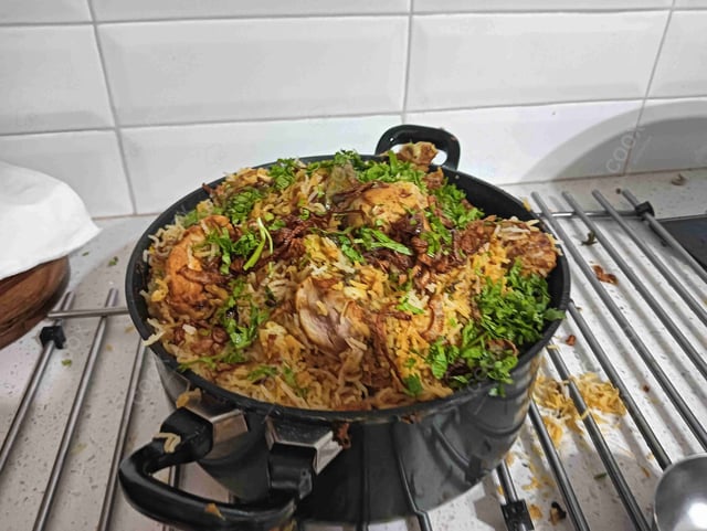 Delicious Chicken Biryani prepared by COOX